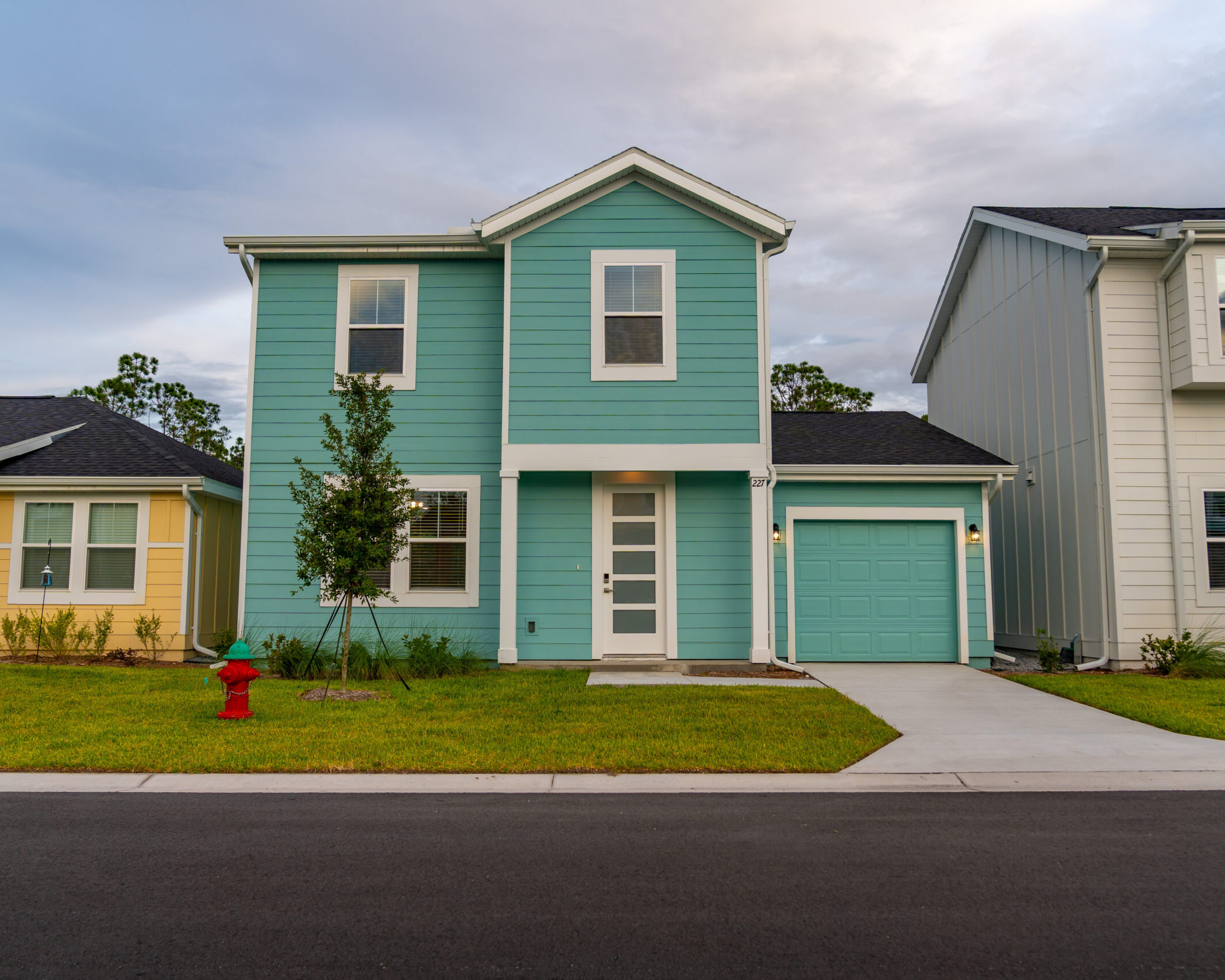 JLM Living's The Eleanor Daytona Beach blue build to rent home