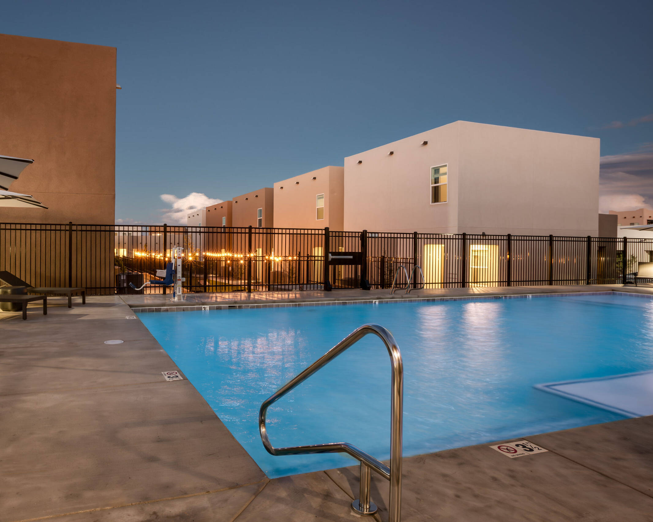 in-ground pool at twilight