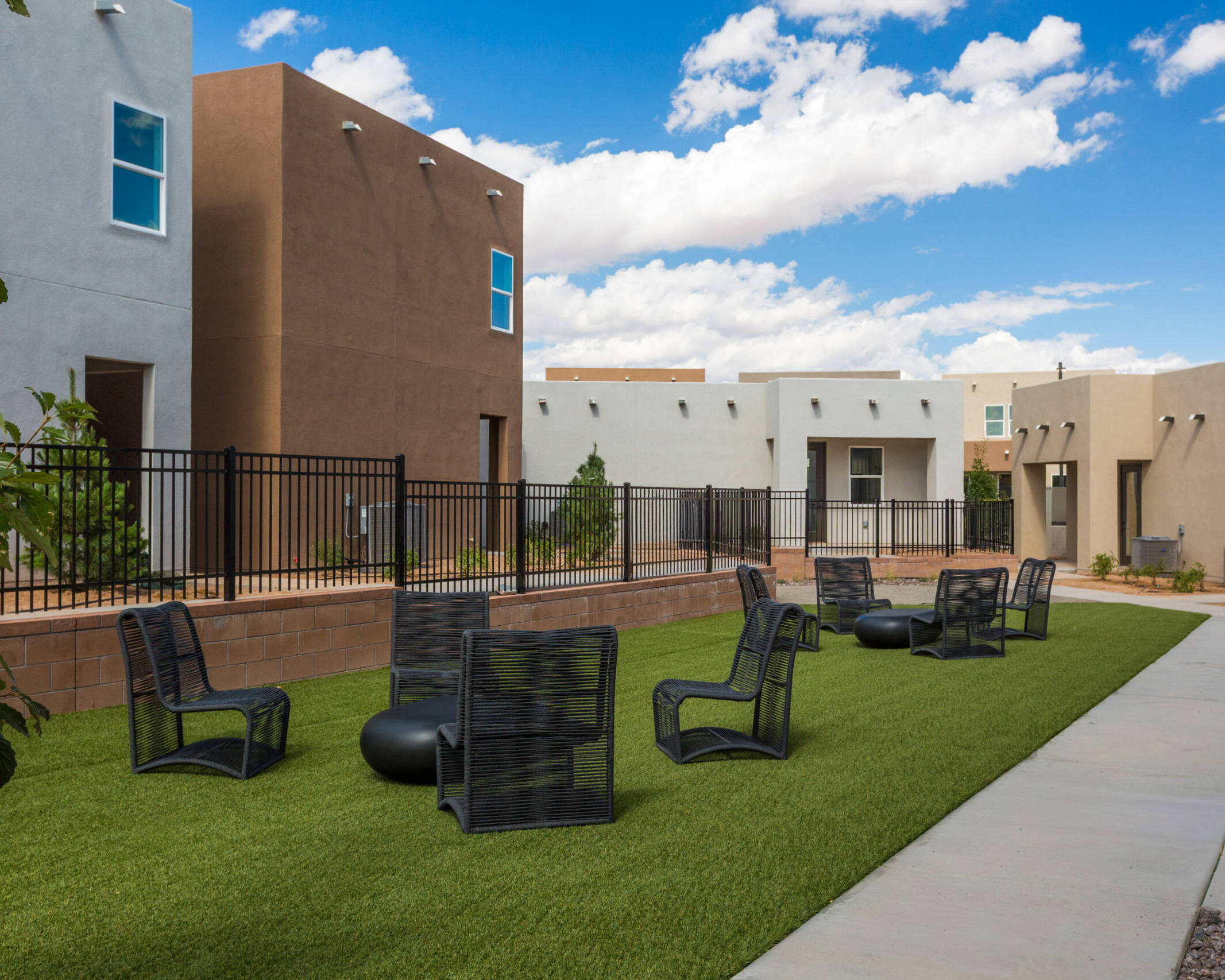 abstract lawn chairs on a turf lawn
