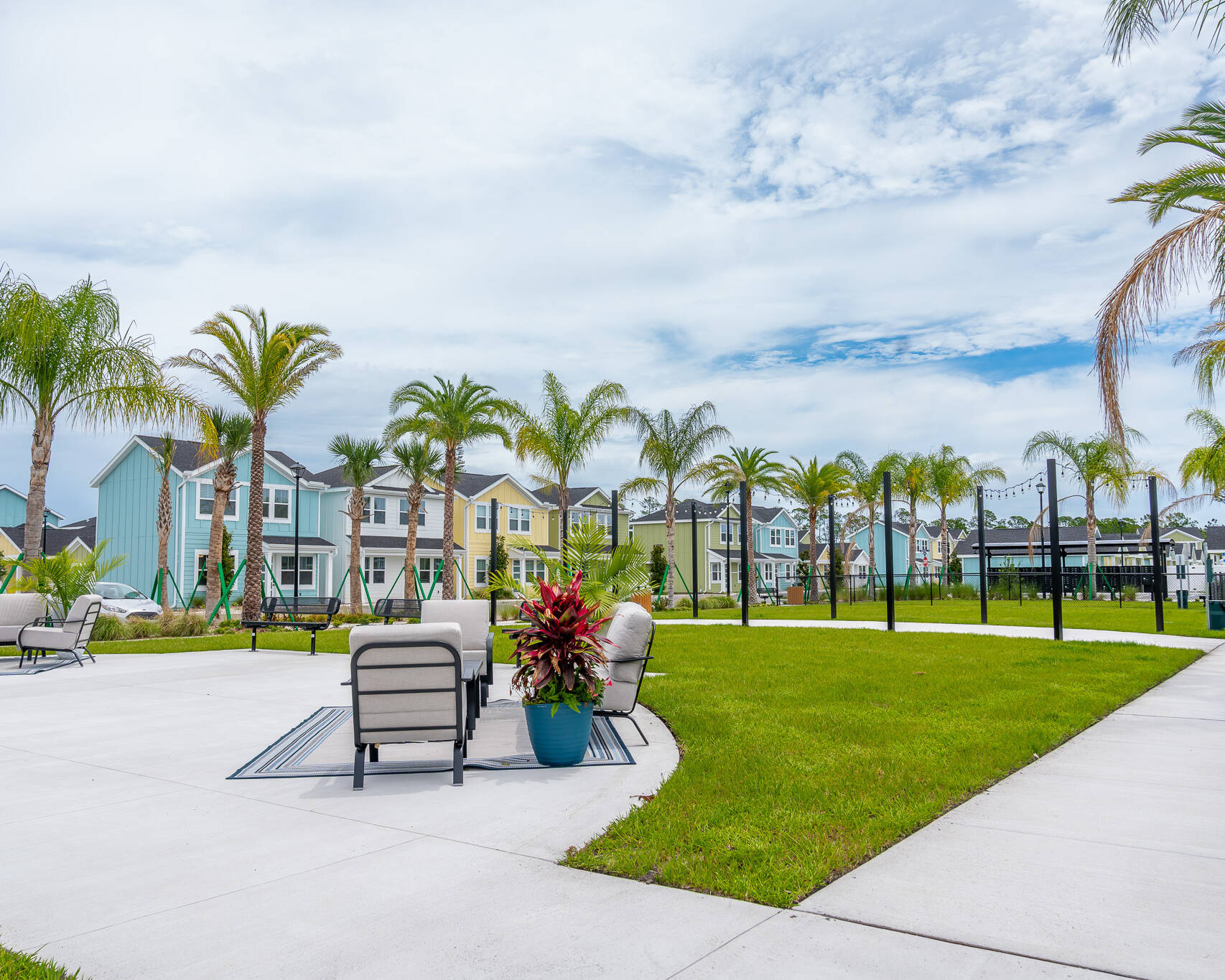 outdoor seating area under florida palm trees
